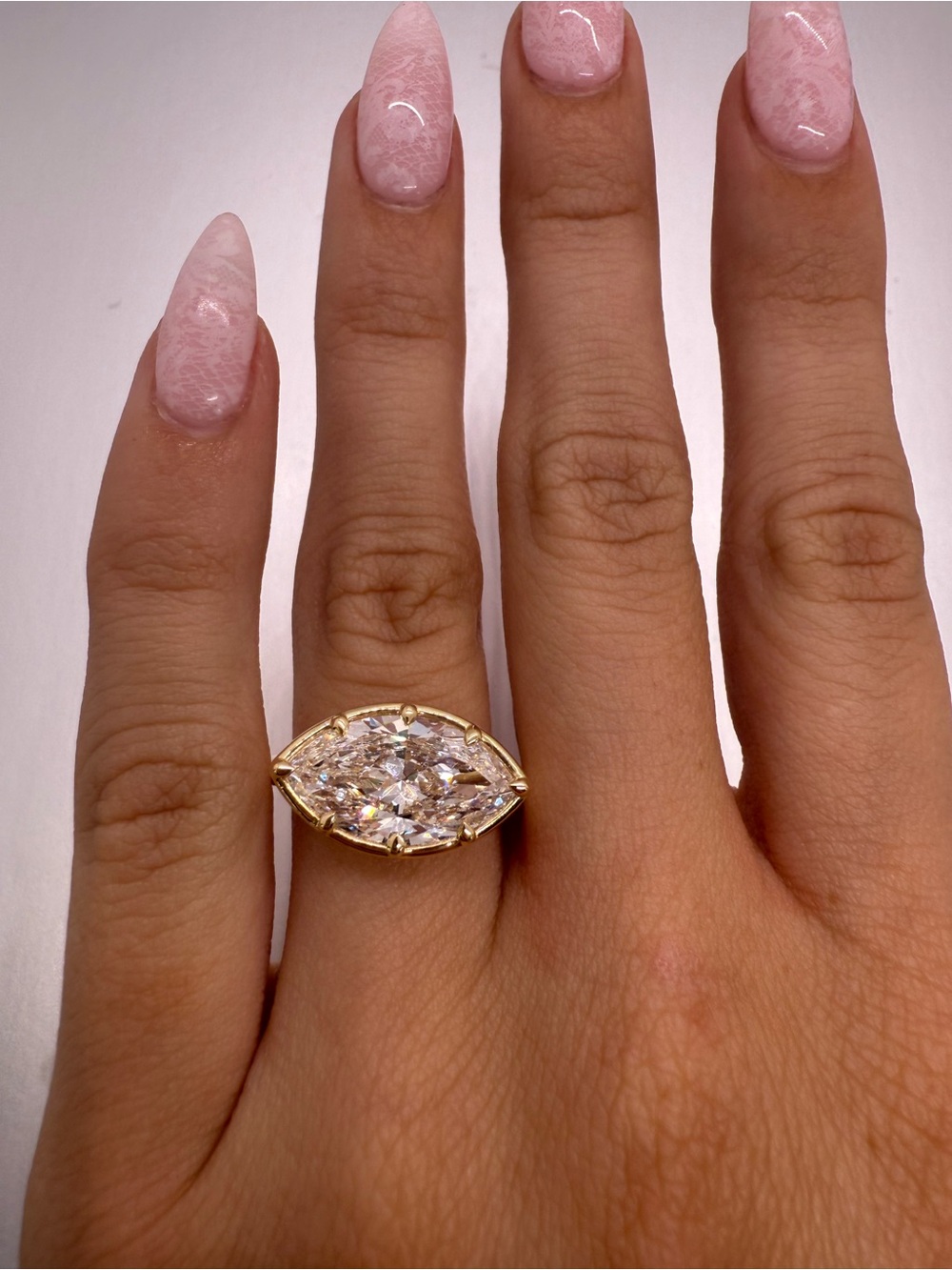 4.01 carat E VS1 marquise solitaire east west bezel engagement ring